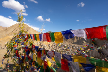 Prayer tibetan flags at the Leh Palace with Leh city top view, Leh Ladakh, India.