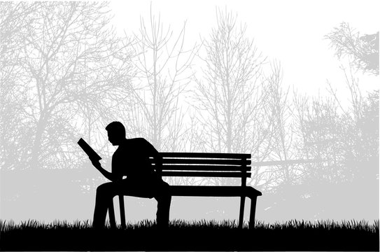 Silhouette of a man with a book.