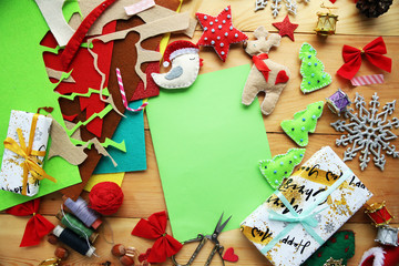 Christmas gifts and felt toys on a wooden wooden table