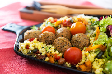 Kofta Tagine Moroccan Meatballs Served With Semolina and Vegetables