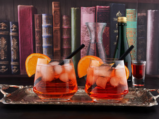 Two glasses of Aperol Spritz, an aperitif cocktail consisting of prosecco, Aperol and soda water,...
