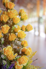 yellow roses with blurry bright, sunlight  background.