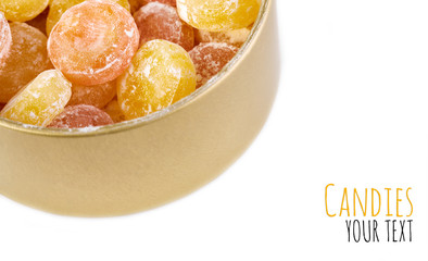 Colored round candy in powdered sugar. Bright candy.