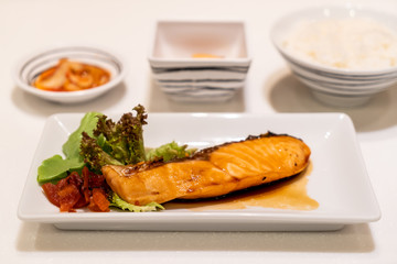 grilled salmon steak with sauce