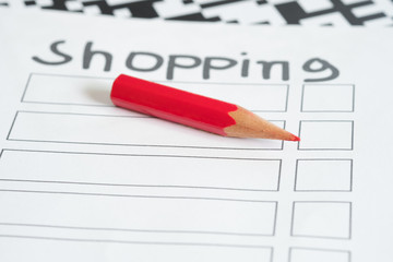 Red pencil and a shopping list