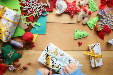 happy New Year. child is packing presents
