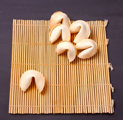 Six Chinese fortune cookies with prediction on the table