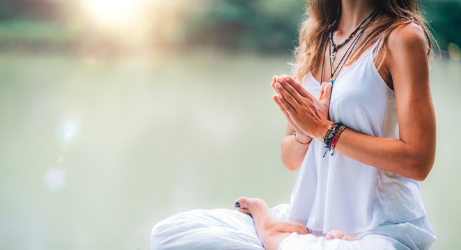 Fototapeta Mindfulness and Meditation. Yoga Woman. Hands in Prayer Position.