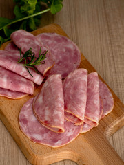 bacon sliced on a wooden background