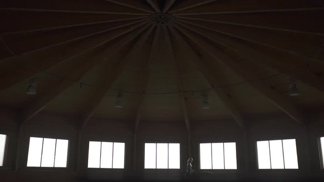 horse with a rider running around in the circus, the silhouette of a horse, static shooting