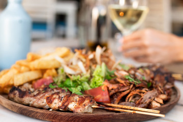 Assorted delicious mix grill dish in restaurant, Bali island.