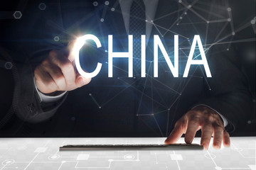 Business man touching screen with 