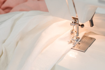 sewing machine, white fabric sewing, tailor
