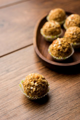 Oats laddu or Ladoo also known as Protein Energy balls. served in a plate or bowl. selective focus