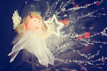 Christmas angel holding a star