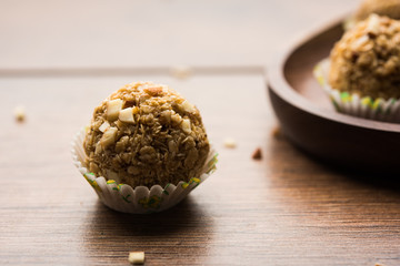 Oats laddu or Ladoo also known as Protein Energy balls. served in a plate or bowl. selective focus