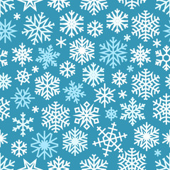 Winter seamless pattern with white snowflakes. Vector illustration