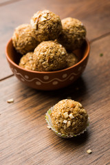 Oats laddu or Ladoo also known as Protein Energy balls. served in a plate or bowl. selective focus