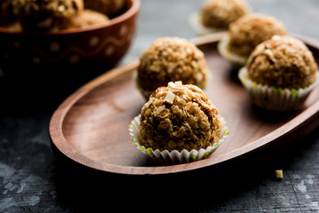 Oats laddu or Ladoo also known as Protein Energy balls. served in a plate or bowl. selective focus