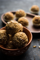 Oats laddu or Ladoo also known as Protein Energy balls. served in a plate or bowl. selective focus