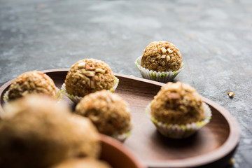 Oats laddu or Ladoo also known as Protein Energy balls. served in a plate or bowl. selective focus