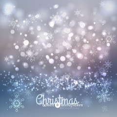 Bokeh lights and snowflakes chritmas background