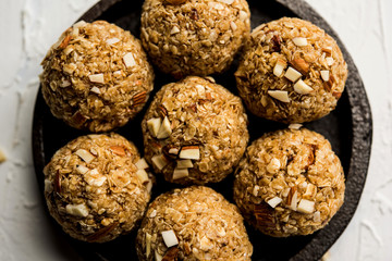 Oats laddu or Ladoo also known as Protein Energy balls. served in a plate or bowl. selective focus