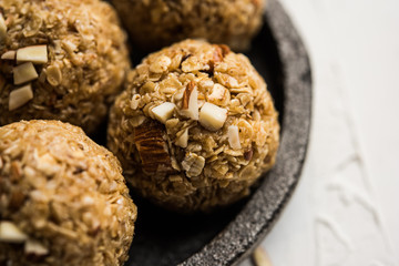 Oats laddu or Ladoo also known as Protein Energy balls. served in a plate or bowl. selective focus