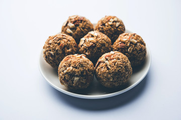Oats laddu or Ladoo also known as Protein Energy balls. served in a plate or bowl. selective focus
