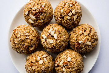 Oats laddu or Ladoo also known as Protein Energy balls. served in a plate or bowl. selective focus