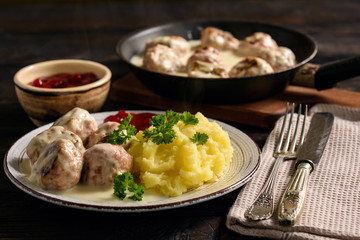Swedish meatballs  with creamy gravy, mashed potatoes and lingonberry sauce.