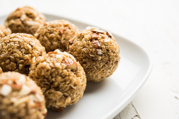 Oats laddu or Ladoo also known as Protein Energy balls. served in a plate or bowl. selective focus