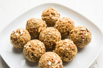 Oats laddu or Ladoo also known as Protein Energy balls. served in a plate or bowl. selective focus