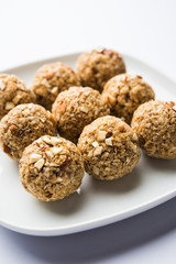 Oats laddu or Ladoo also known as Protein Energy balls. served in a plate or bowl. selective focus