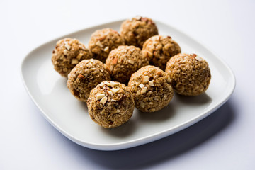 Oats laddu or Ladoo also known as Protein Energy balls. served in a plate or bowl. selective focus