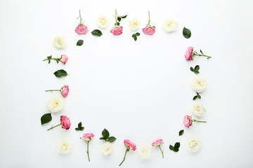 Rose flowers with green leafs on white background