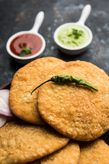 Shegaon or Rajasthani Kachori served with green Chutney and tomato ketchup