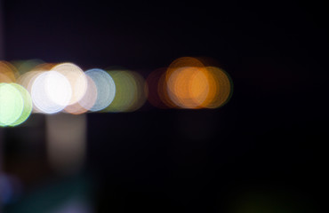 Colorful defocused lights blurred for editing with a black background. 