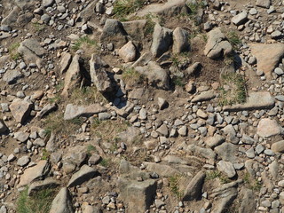 Stony lodging in the mountains, dangerous path