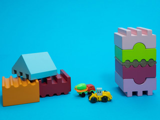 small kid toys construction site with vivid colorful wooden blocks, truck, concrete mixer
