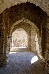 Interior of the traditional Georgian wine cellar with round holes in the floor for clay jugs for wine. Kveri