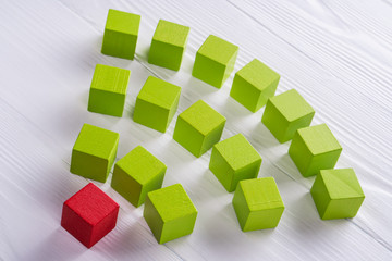 Wi fi sign from green wooden blocks on the white background.