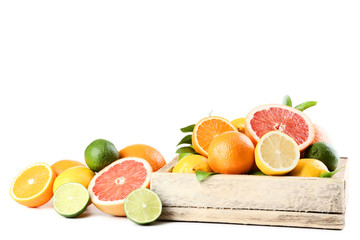Citrus fruits with wooden crate isolated on white background
