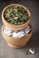 Pumpkin seeds in wooden bowls
