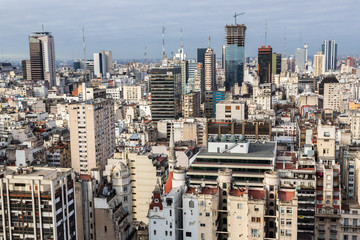 Buenos Aires Central Business District (Microcentro) skyscrapers skyline in winter under cloudy lead sky. Argentina, South, Latin America aerial view.