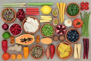 Fototapeta na wymiar Super food for fitness concept with chicken, fish, grain mix, fruit, vegetables, herbs and spice. Foods high in antioxidants, protein, anthocyanins, dietary fibre and vitamins. Top view.