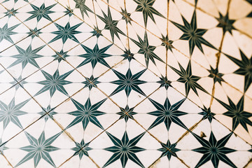 Green and White Star Pattern Tiled Background