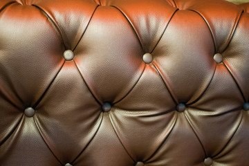 Detail of classic furniture sofa in living room Closeup texture of vintage leather sofa.
