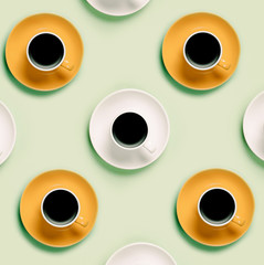Yellow and White Cups of black coffee on green background