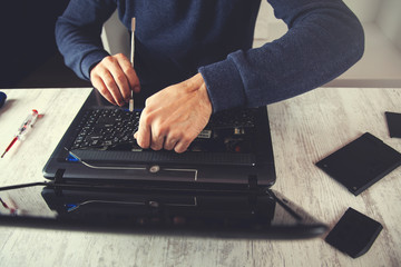 Laptop keyboard disassembling